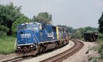 CSX 8741 wears its former paint scheme with a consist of mixed freight